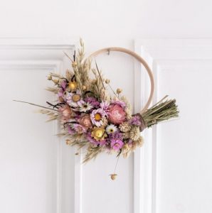 Pink and yellow dried flower half wreath