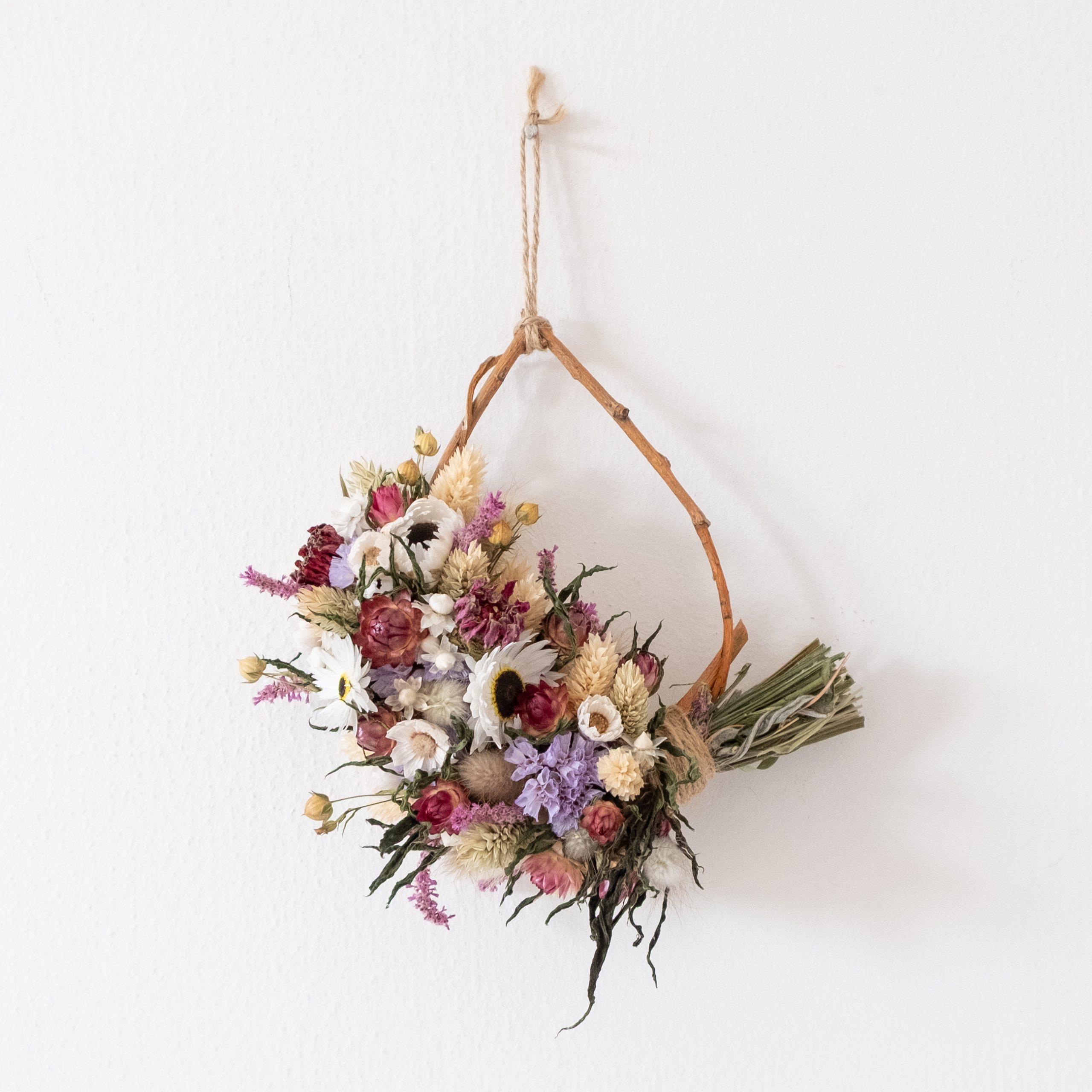 Mini half covered dried flower wreath, dark pinks, lilacs and greens