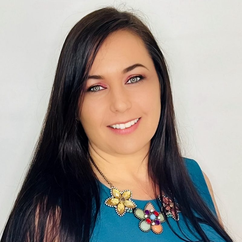 Tiffany Kaehler, The Florist Coach – florist business coach and third-generation florist, smiling professional portrait